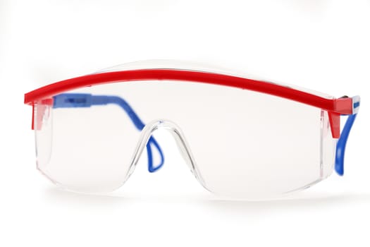 Transparent protective goggles on white