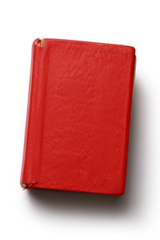 Old red book on white background