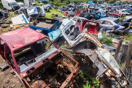 Vehicle scrap yard of destroyed cars from road accidents.