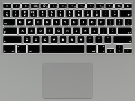 Top view of illuminated keyboard on modern laptop computer