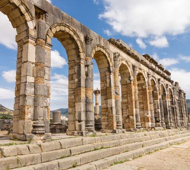 Volubilis is a partly excavated Roman city in Morocco situated near Meknes between Fes and Rabat. Built in a fertile agricultural area, it was developed from the 3rd century BC onwards as a Phoenician Carthaginian settlement