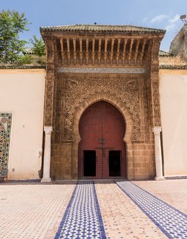 Large wooden doors in archway  as entrance to Dar El Makhzen palace, located in El Mechouar Stinia. It was Moulay Isma��l official palace