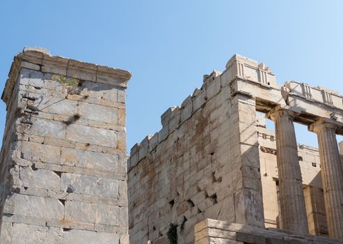 Columns of old ruined buildings of Propylaea in the Acropolis in Athens Greece