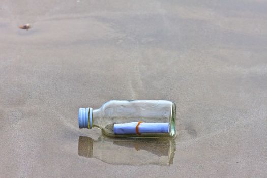  glass bottle on the beach 