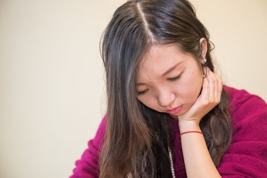 Sad young woman looking depressed