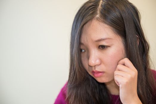 Sad young woman looking depressed