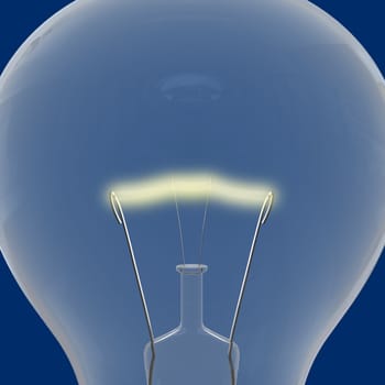 Close up of lightbulb on blue background