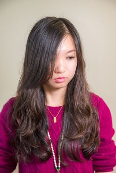 Portrait of young woman looking stressed out