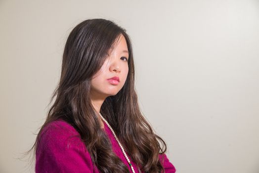 Portrait of bossy looking young woman