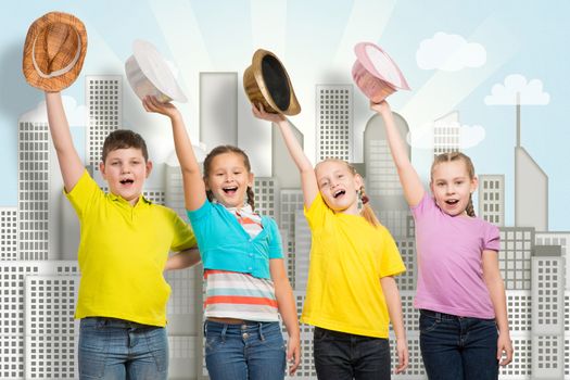 children in a row, wearing a hat. hands up and laugh