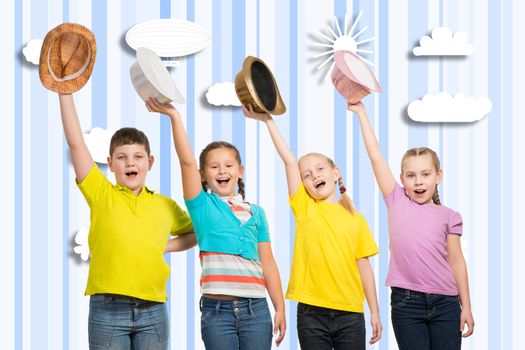 children in a row, wearing a hat. hands up and laugh