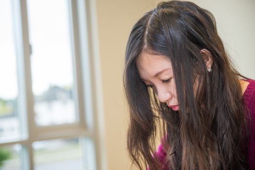 Sad young woman looking depressed