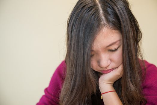 Sad young woman looking depressed