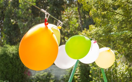 Colorful balloons for games in a childhood garden party