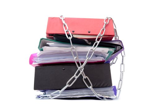 Large pile of documents and files chained together 