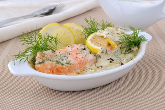 Salmon under gentle creamy lemon sauce with spices