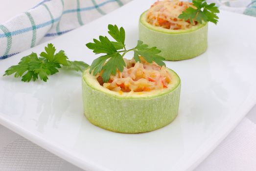 Ring of zucchini stuffed with vegetables with rice and cheese