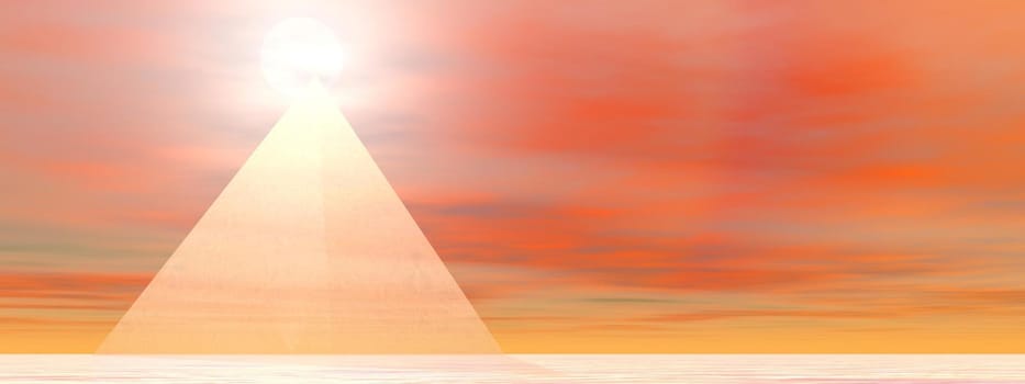 Transparent pyramid made with glass in front of sunset