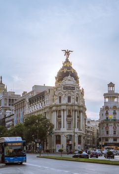 MADRID, SPAIN - SEPTEMBER 2: View of famous Metropolis building in Gran Via street, in Madrid, Spain, on September 2, 2013