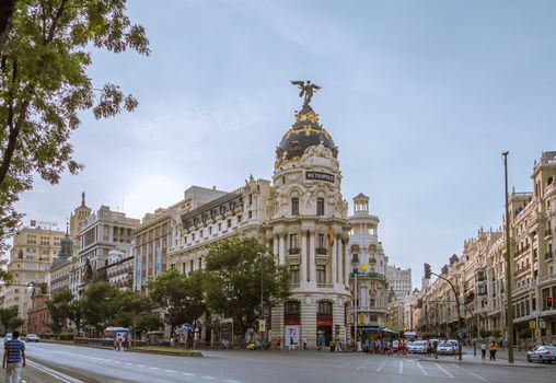 MADRID, SPAIN - SEPTEMBER 2: View of famous Metropolis building in Gran Via street, in Madrid, Spain, on September 2, 2013