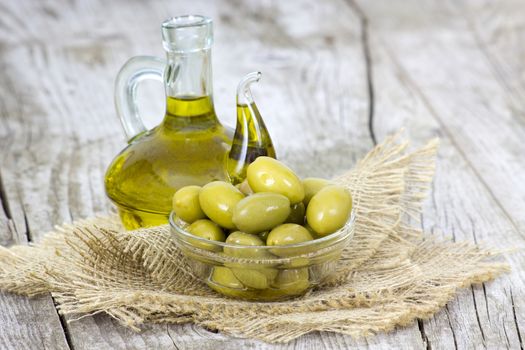 Olive oil and green olives