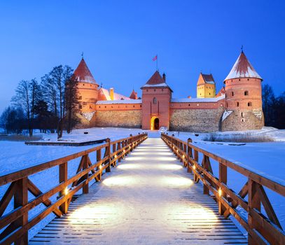 Trakai. Trakai is a historic city and lake resort in Lithuania. It lies 28 km west of Vilnius, the capital of Lithuania.