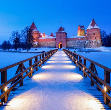 Trakai. Trakai is a historic city and lake resort in Lithuania. It lies 28 km west of Vilnius, the capital of Lithuania.