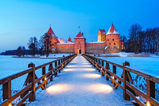 Trakai. Trakai is a historic city and lake resort in Lithuania. It lies 28 km west of Vilnius, the capital of Lithuania.   