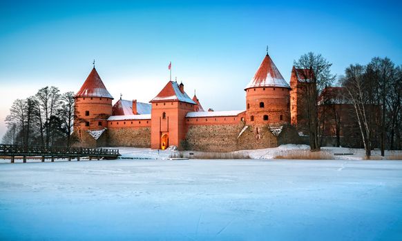Trakai. Trakai is a historic city and lake resort in Lithuania. It lies 28 km west of Vilnius, the capital of Lithuania.