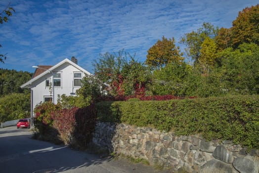 Sponvika is a village in Halden, Norway, and most of the houses are of older origin but well maintained. Image is shot in late September 2013.