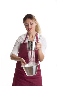 woman sieving flour