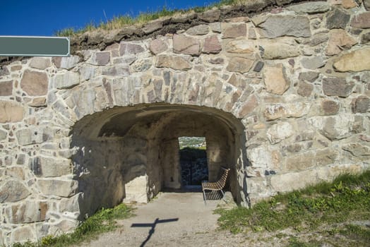 The image is shot in September 2013 at Fredriksten Fortress in Halden, Noway and shows the Large powderhouses and Northern curtain wall that protects the Citadel to the west and connects Queen's bastion with Prince Chritians bastion, the curtain wall was completed in 1668