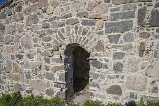 The image is shot in September 2013 at Fredriksten Fortress in Halden, Noway and shows the Large powderhouses and Northern curtain wall that protects the Citadel to the west and connects Queen's bastion with Prince Chritians bastion, the curtain wall was completed in 1668