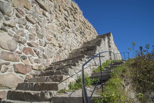 The image is shot in September 2013 at Fredriksten Fortress in Halden, Noway and shows the Large powderhouses and Northern curtain wall that protects the Citadel to the west and connects Queen's bastion with Prince Chritians bastion, the curtain wall was completed in 1668