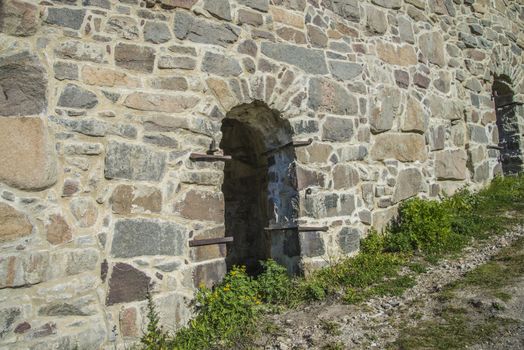 The image is shot in September 2013 at Fredriksten Fortress in Halden, Noway and shows the Large powderhouses and Northern curtain wall that protects the Citadel to the west and connects Queen's bastion with Prince Chritians bastion, the curtain wall was completed in 1668