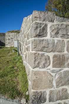 Stone walls were built around 1660 years and served as an outer fortification. Image is shot at Fredriksten fortress in Halden, Norway a day in September 2013.