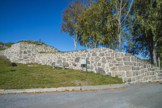 Stone walls were built around 1660 years and served as an outer fortification. Image is shot at Fredriksten fortress in Halden, Norway a day in September 2013.