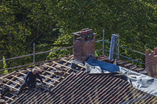 The school building at Fredriksten fortress in Halden, Norway is a major Maintenance work on the roof and new grout on the chimneys. Photo is shot in September 2013.