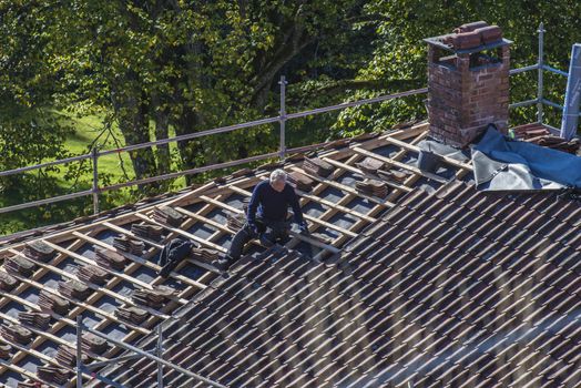 The school building at Fredriksten fortress in Halden, Norway is a major Maintenance work on the roof and new grout on the chimneys. Photo is shot in September 2013.