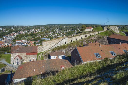 The image is shot in September 2013 at Fredriksten Fortress in Halden, Noway and shows the Large powderhouses and Northern curtain wall that protects the Citadel to the west and connects Queen's bastion with Prince Chritians bastion, the curtain wall was completed in 1668