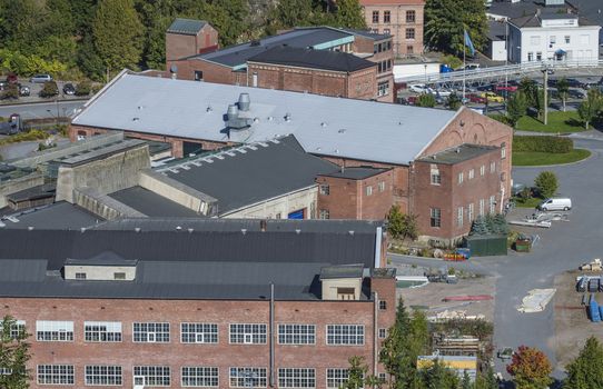 Saugbrugs paper factory which is a Norwegian paper factory in Halden. It is the oldest wood processing plant in Norway which is still in operation. Image is shot at Fredriksten fortress in Halden, Norway a day in September 2013.