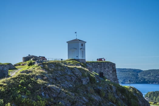 The bell tower freshly painted. The purpose of the bell tower was to warn in case of fire or a surprise attack.  Image is shot at Fredriksten fortress in Halden, Norway a day in September 