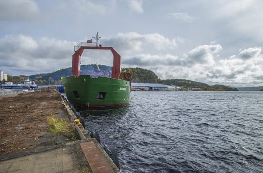 MV St.pauli leaving Halden, (Norway) harbor with a cargo full of timber. Photo is shot 9 October 2013. Vessel's Details: Ship type: General cargo, Year Built: 1983, Length x breadth: 92 m X 15 m, Gross Tonnage: 3075, Dead Weight: 3219 t, Flag: Gibraltar (GI).