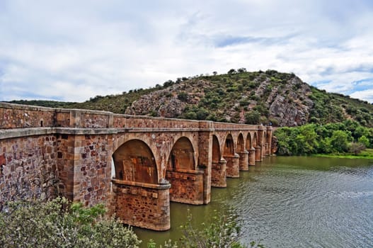Old bridge over river in Zamora Spain