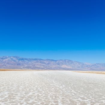 USA, Death Valley. Badwater point: salt road in the middle of the desert