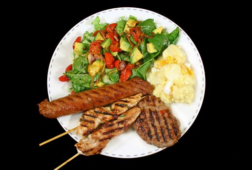 BBQ chicken tenderloin skewers, beef sausage, beef patty with spinach salad and potato salad.