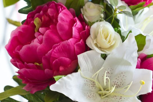 Bright and beautiful colors of plastic flowers