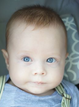 Little baby boy with blue eyes  portrait