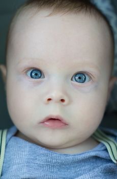 Little baby boy with blue eyes  portrait