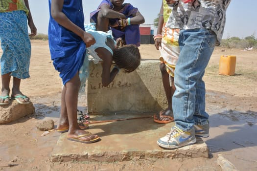 African children at the fountain